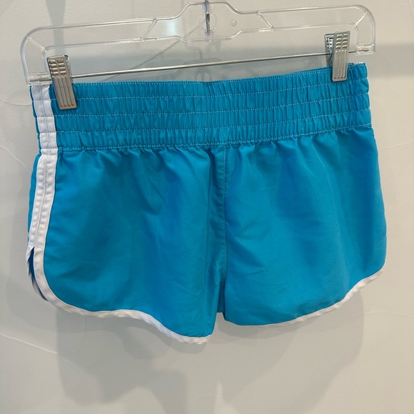 SOLDXhilaration XS Turquoise Running Shorts with White Trim - Picture 2 of 4